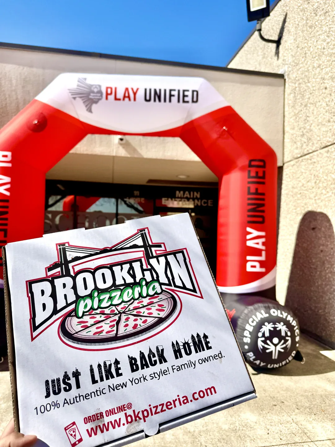 A Brooklyn Pizzeria pizza box at a Play Unified event