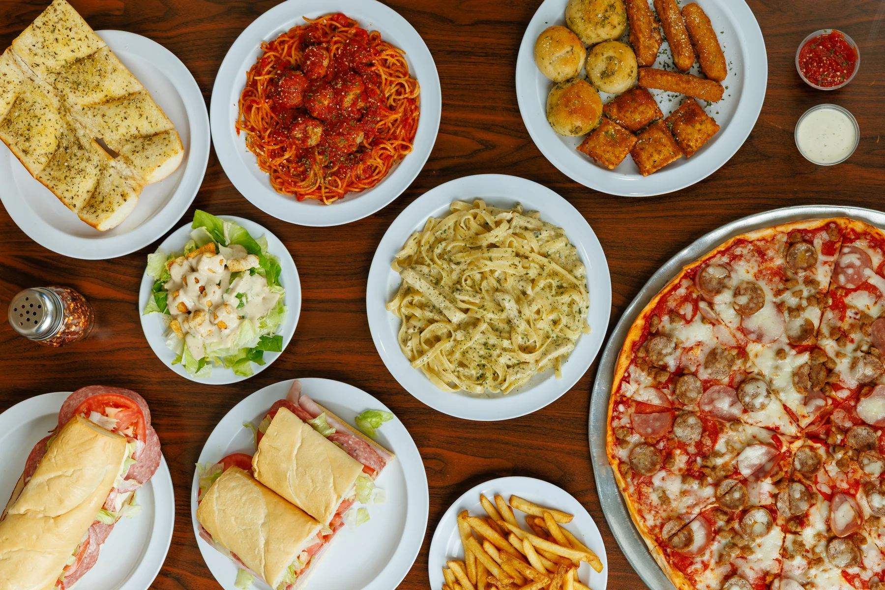 Brooklyn Pizzeria pizza, pasta, sandwiches, salad and sides, ready to share